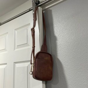 Medium sized brown leather crossbody purse
